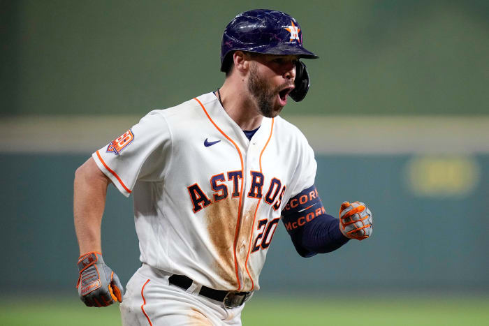 Chas McCormick celebrates after hitting a solo home run.
